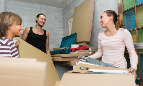 Professional removals in Kensington with moving van outside elegant homes