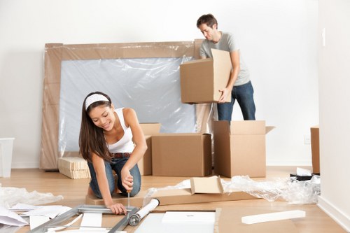 Man with a van loading items for transport
