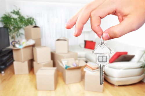 Unpacking boxes in a Kensington apartment after a move