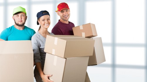 Removal truck and moving crew during a Kensington house move