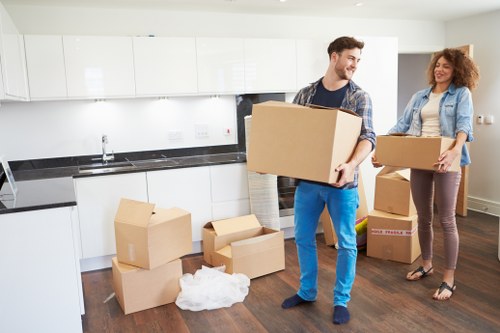 Staff using careful manual handling techniques