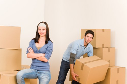 Packed boxes and furniture ready for transport in Kensington