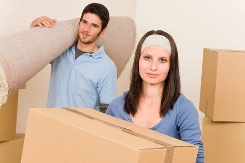 Packed moving boxes ready for Kensington relocation