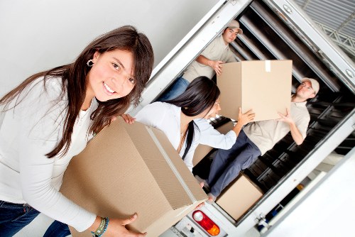 Load-based and cubic-yard van pricing for a small Kensington move