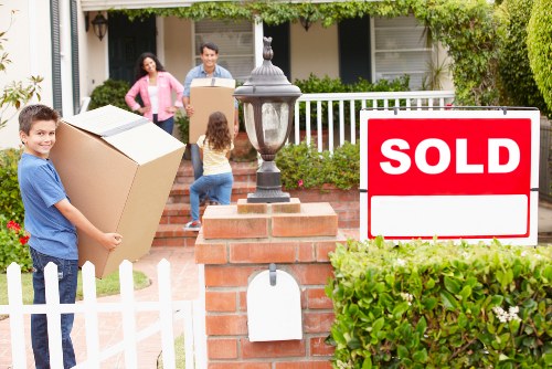 Packed household boxes and furniture ready for a Kensington removals service