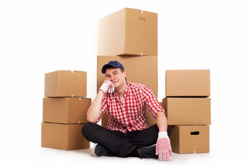 Removal team handling boxes for a student move in Kensington